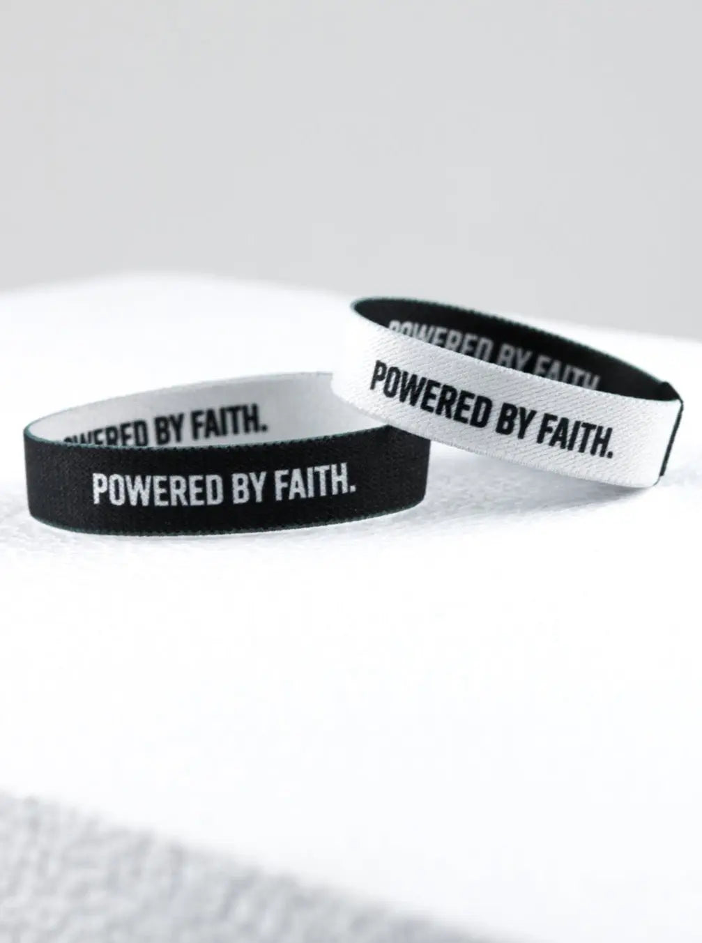 Powered By Faith Wristband - Black/White HolStrength