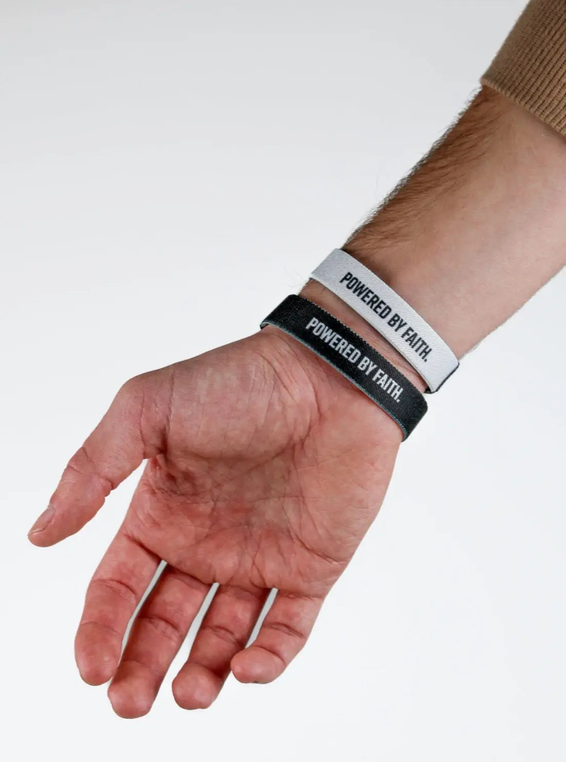 Powered By Faith Wristband - Black/White HolStrength